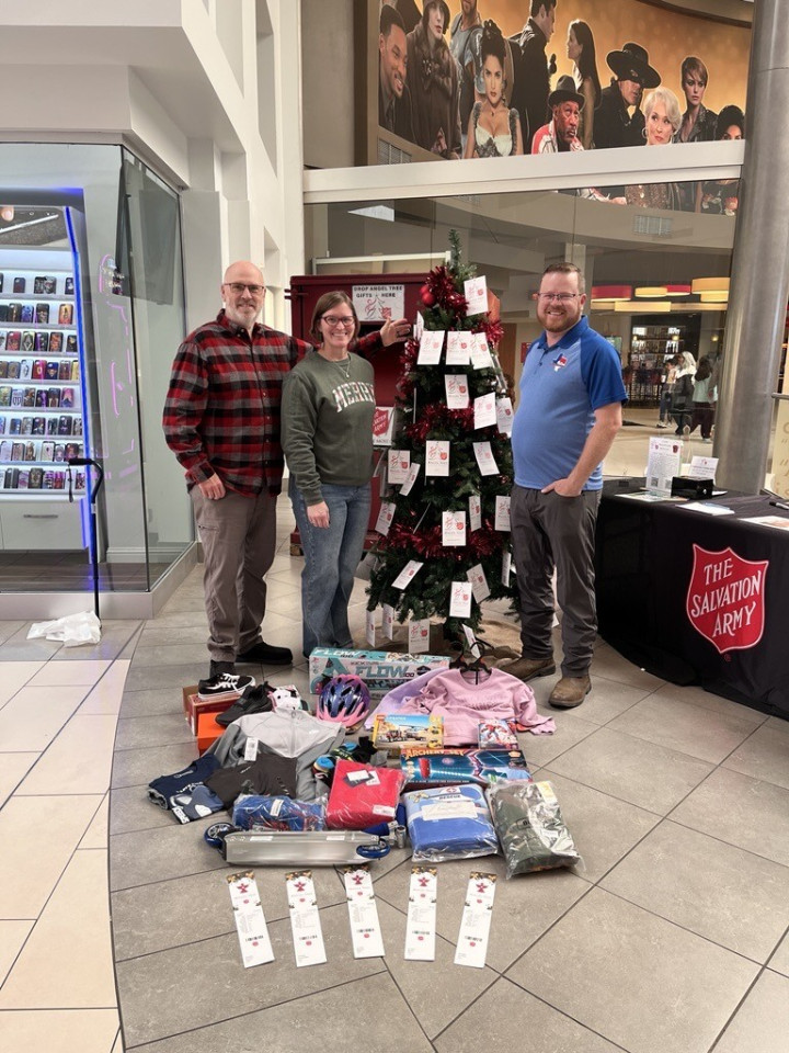 Volunteers in front of Angel Tree